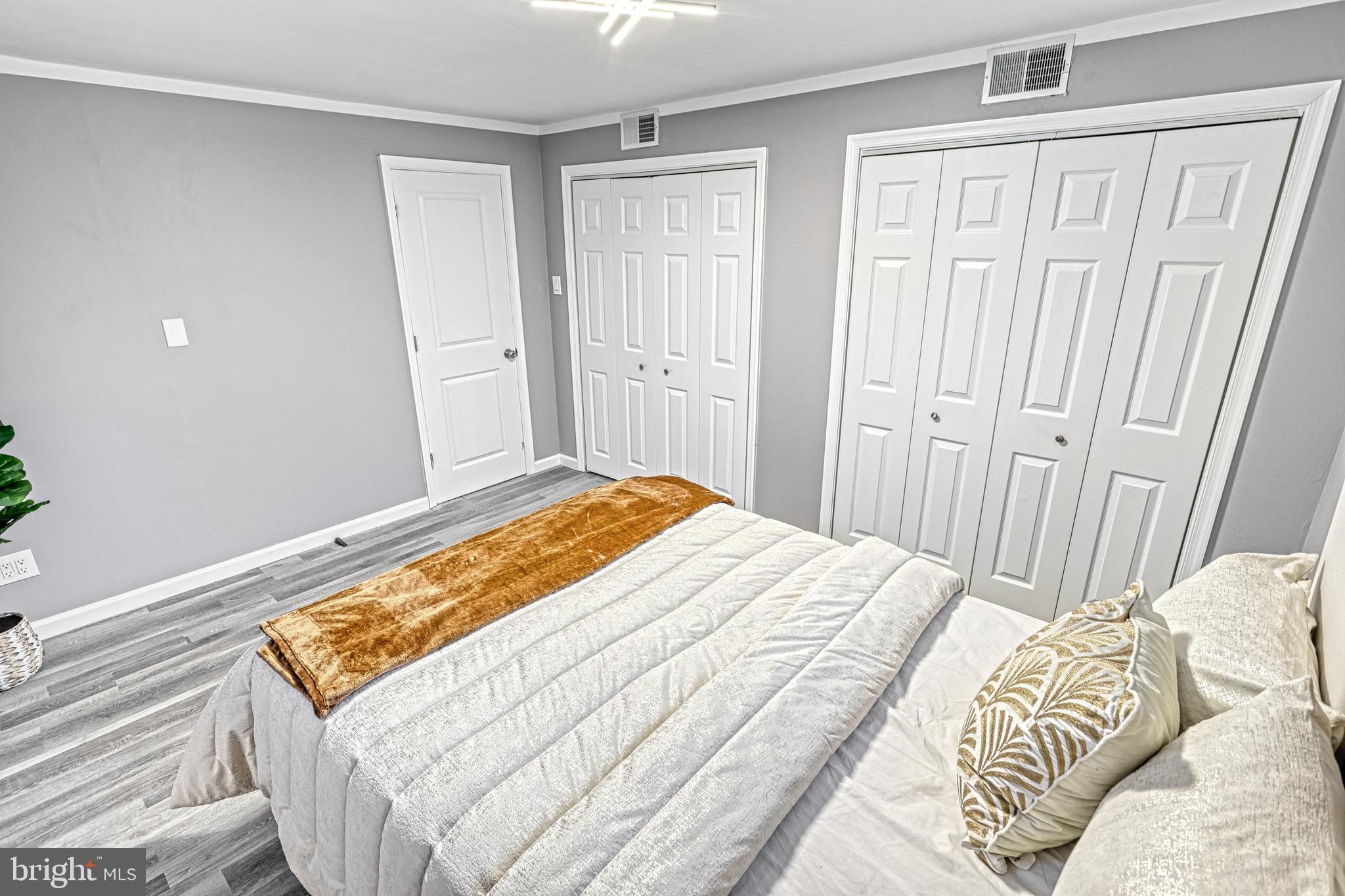 301 State Street Steelton, PA 17113 - Photo 38 of 44 a bedroom with a bed and a window