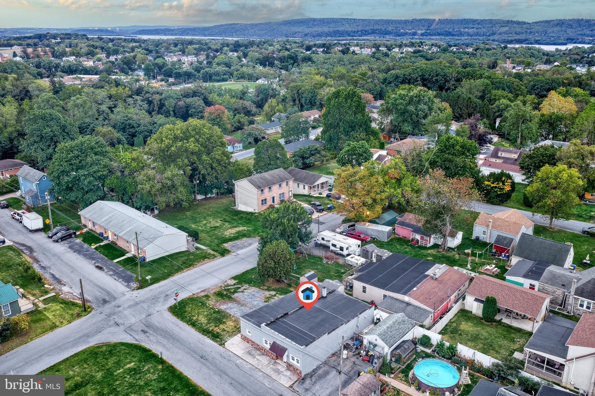 301 State Street Steelton, PA 17113 - Photo 40 of 44 an aerial view of a house with a garden