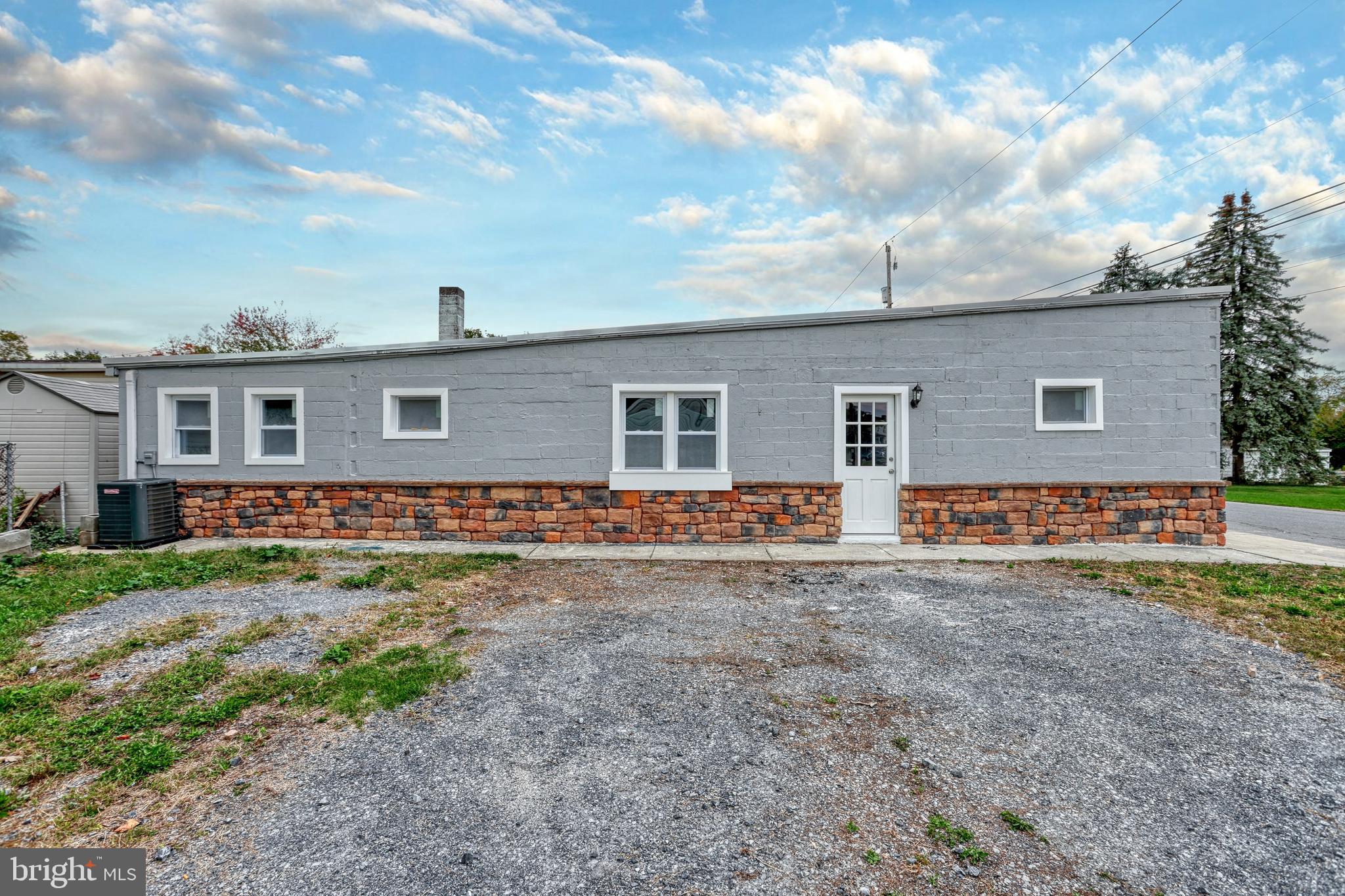 301 State Street Steelton, PA 17113 - Photo 6 of 44 a view of a house with backyard and garden