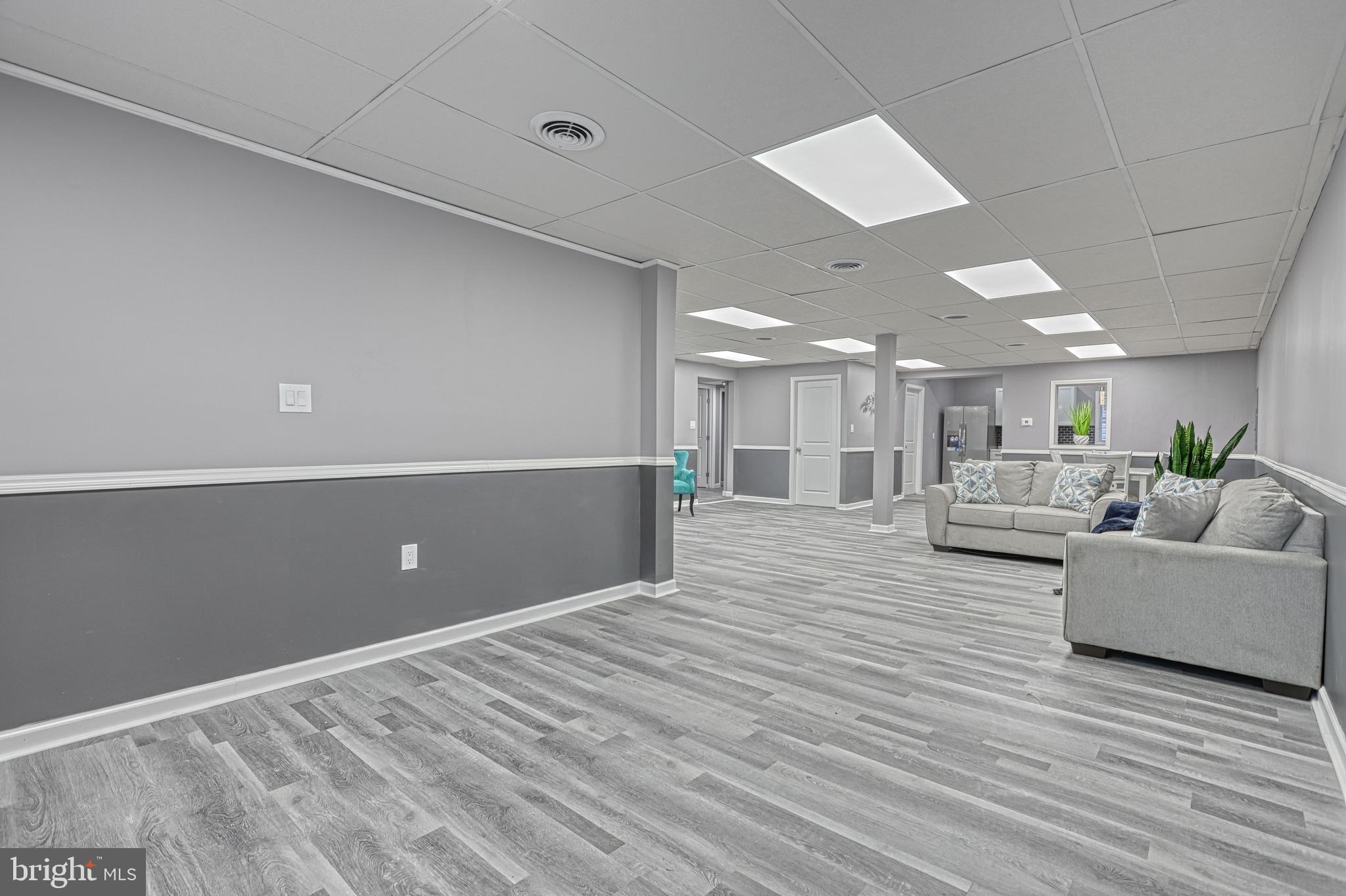 301 State Street Steelton, PA 17113 - Photo 10 of 44 a view of a livingroom with furniture and a ceiling fan