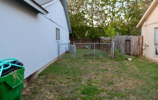 a view of backyard with green space