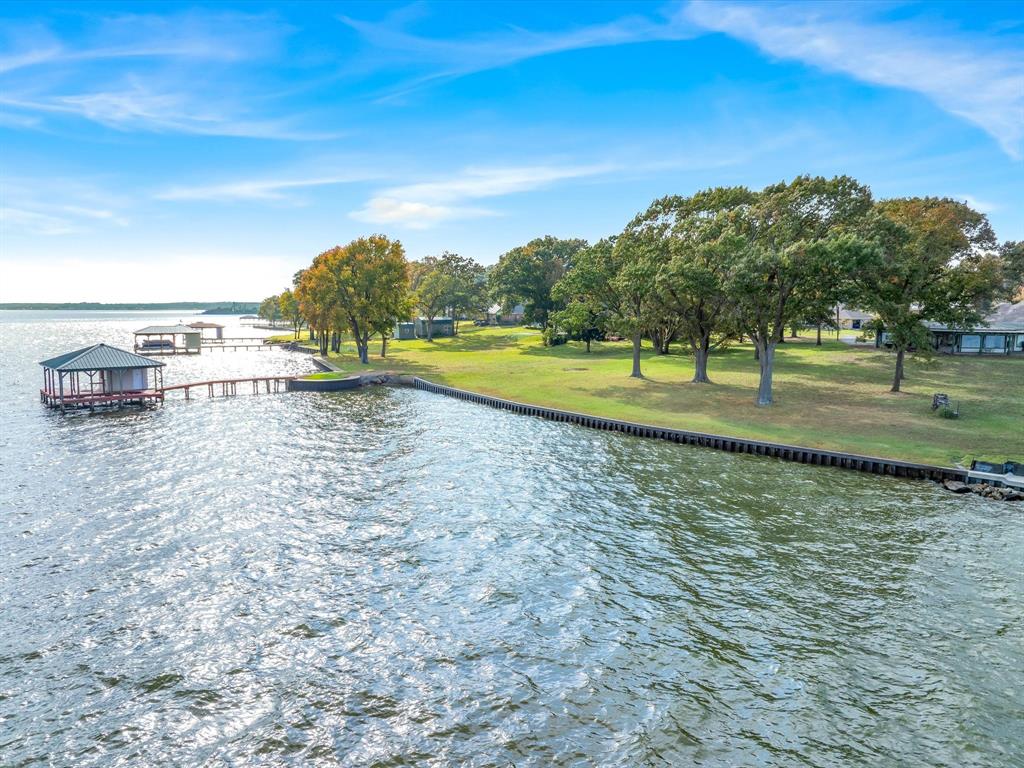 Tbd Blue Water Road Chandler, TX 75758 - Photo 10 of 12 Water view with a dock