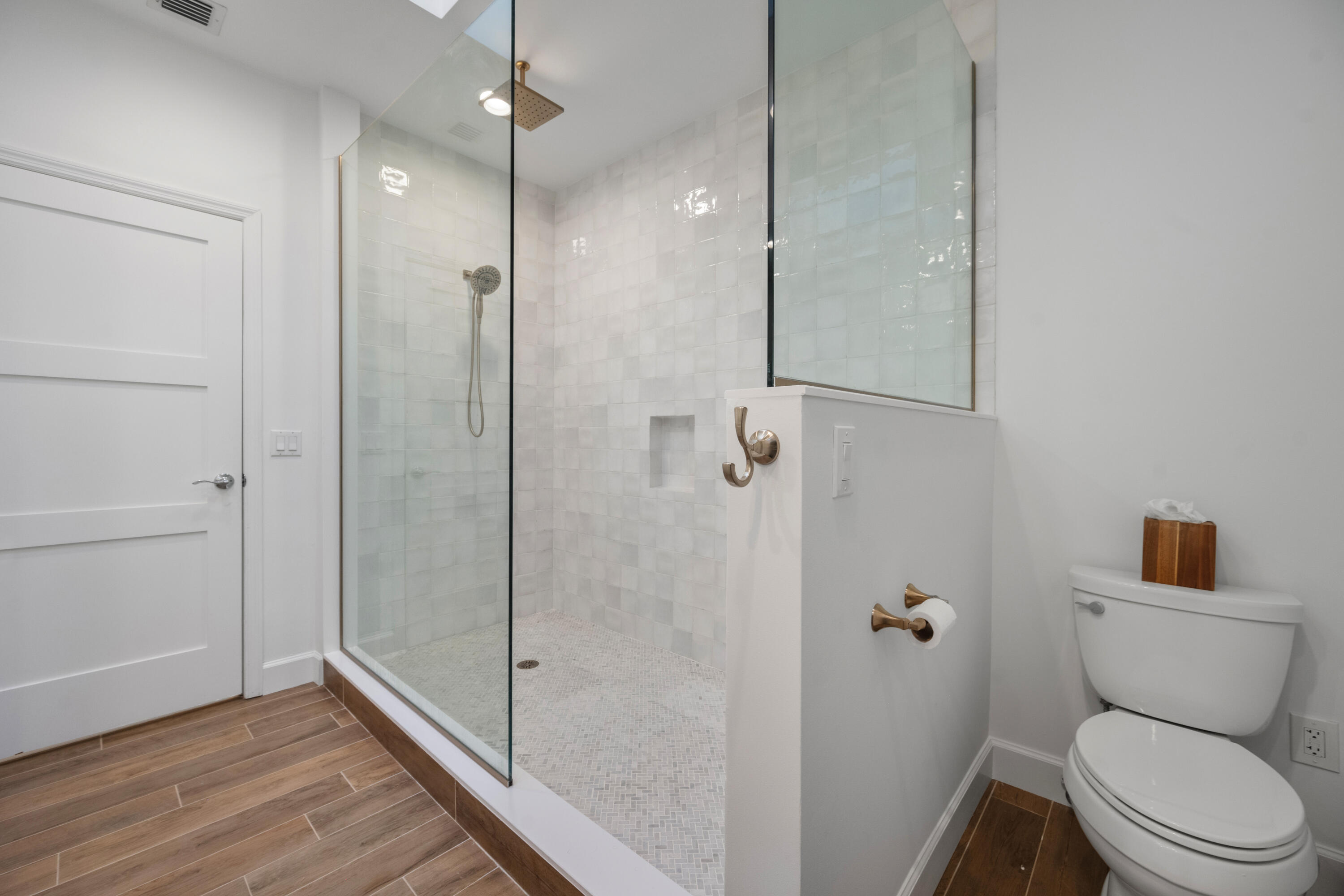 106 Toteka Circle Jupiter, FL 33458 - Photo 19 of 27 a bathroom with a shower a toilet and a sink