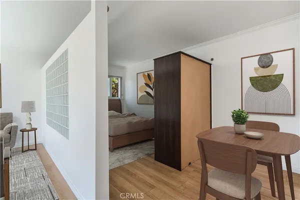 a bedroom with a bed and a table