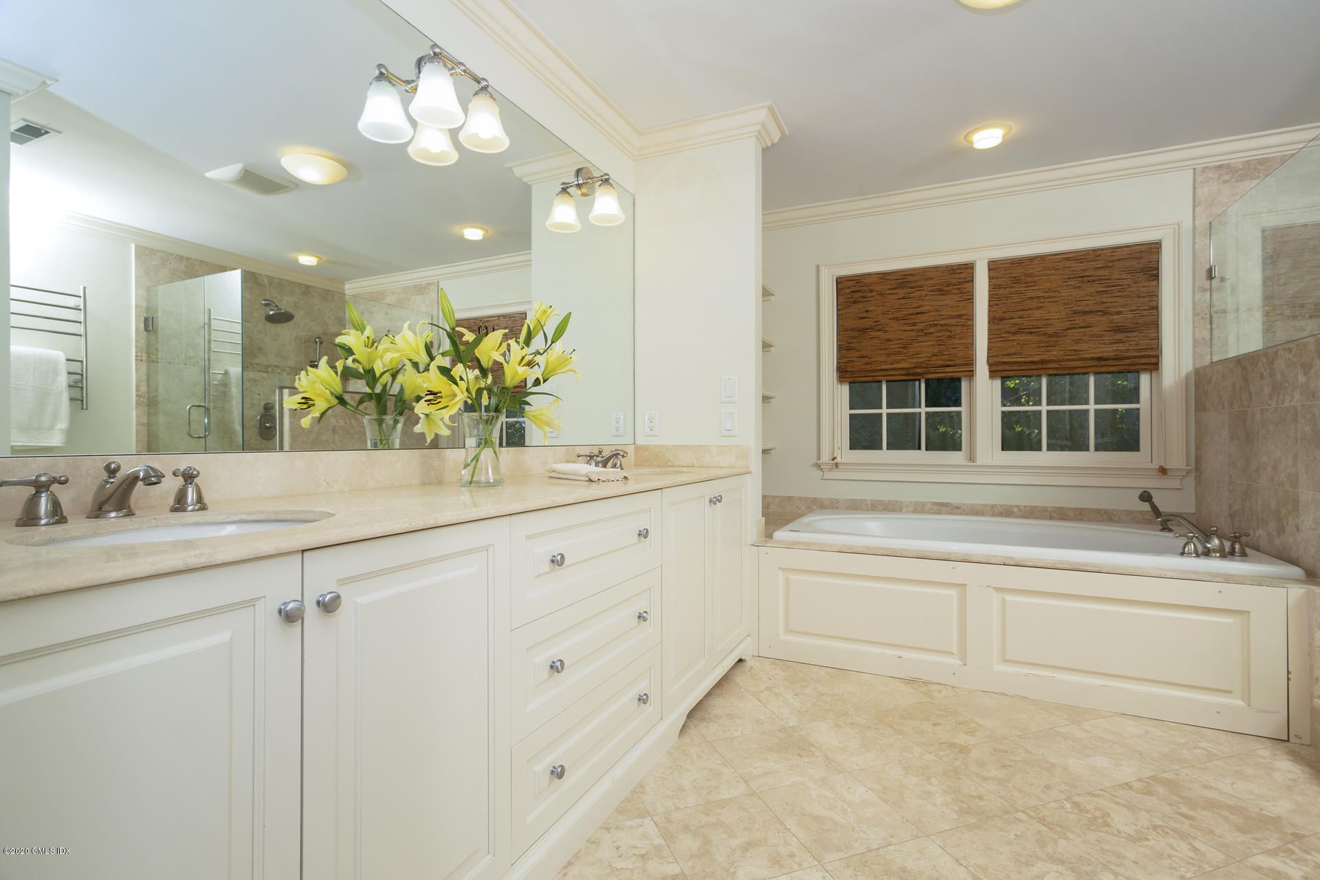 40 Riverside Lane Riverside, CT 06878 - Photo 24 of 45 a bathroom with a tub sink and mirror