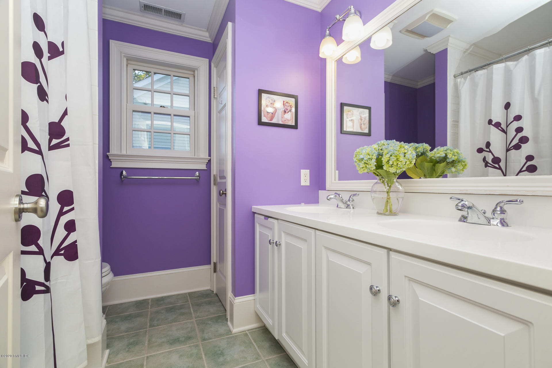 40 Riverside Lane Riverside, CT 06878 - Photo 29 of 45 a bathroom with a sink vanity and a mirror