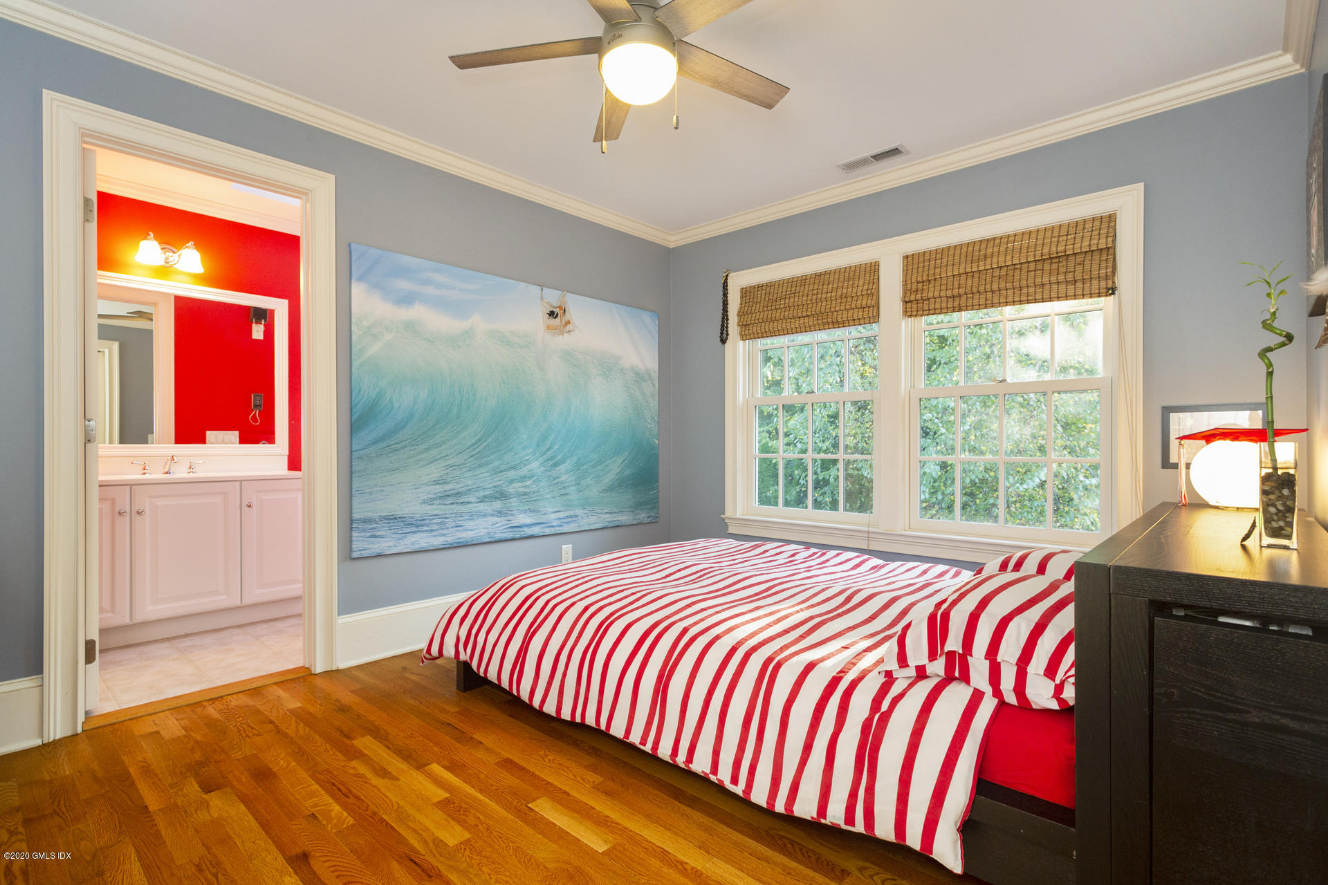 40 Riverside Lane Riverside, CT 06878 - Photo 30 of 45 a bedroom with a bed and a window