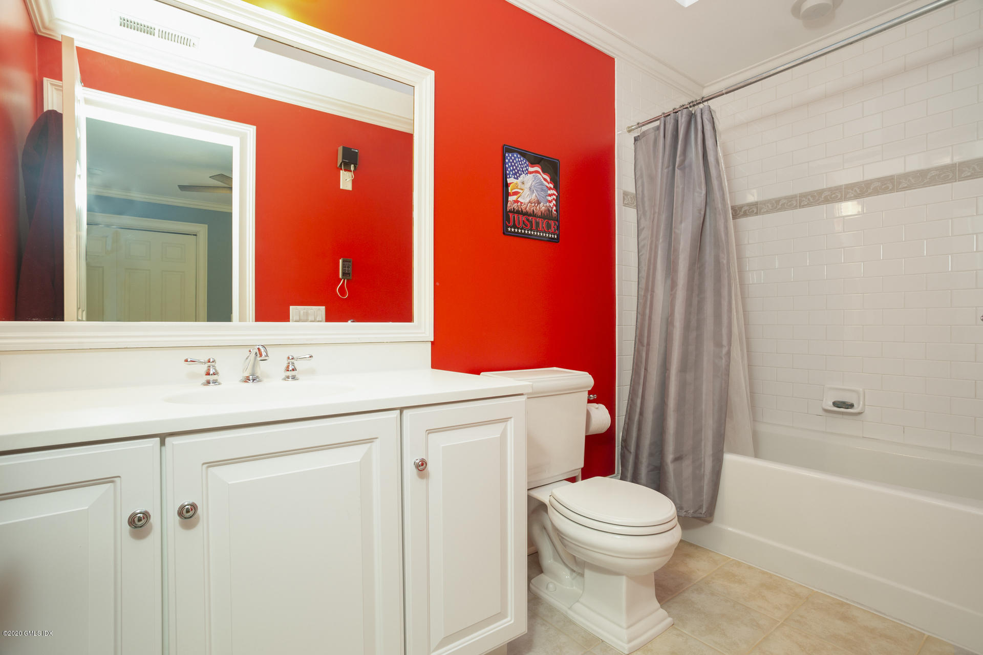 40 Riverside Lane Riverside, CT 06878 - Photo 31 of 45 a bathroom with a sink a toilet and shower
