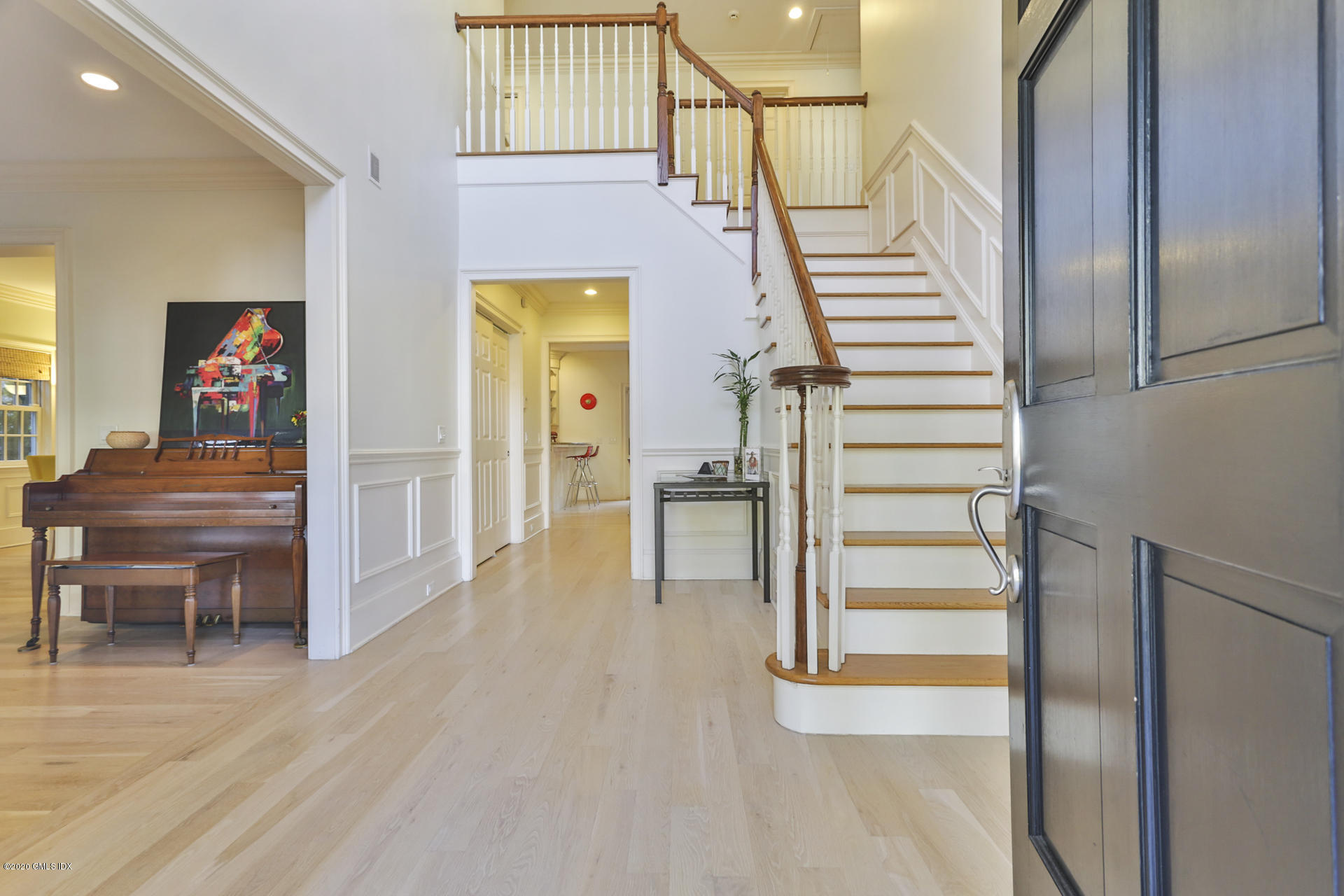 40 Riverside Lane Riverside, CT 06878 - Photo 7 of 45 a view of entryway and hall with wooden floor