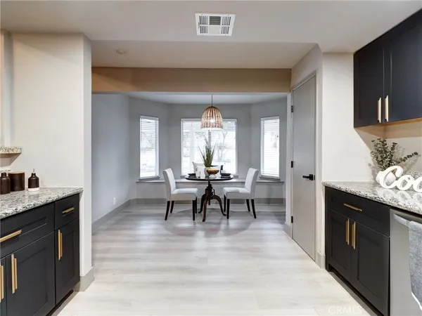 a view of a kitchen from the dining room