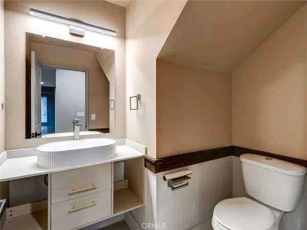 a bathroom with a sink and a toilet