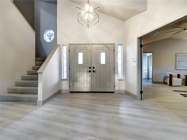 a view of a hallway view with staircase