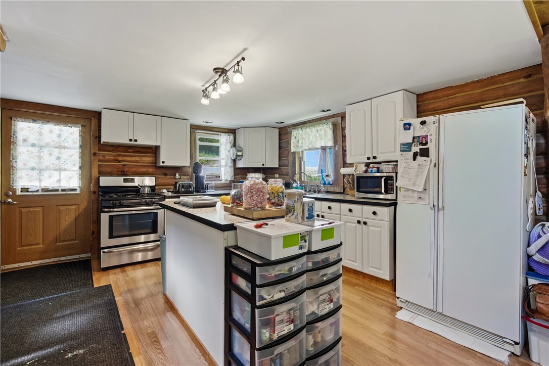 6651 Longsdorf Road Naples, NY 14512 - Photo 15 of 47 Bright kitchen with island