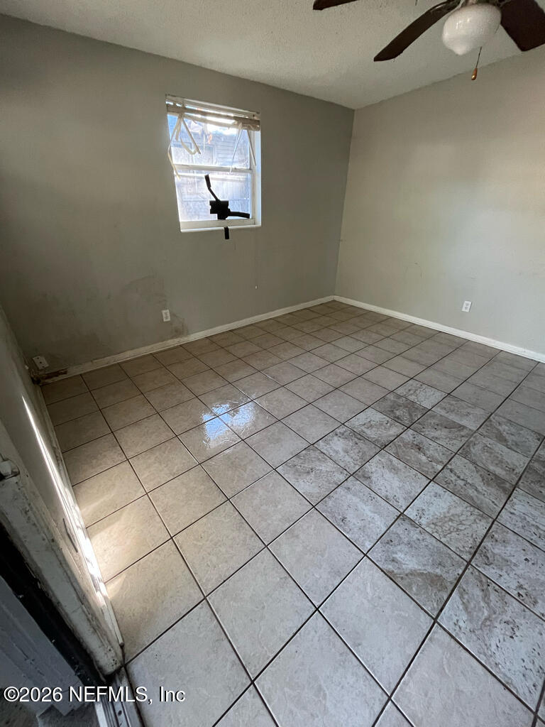 144 Spring Street Jacksonville, FL 32254 - Photo 3 of 7 a view of a room and window