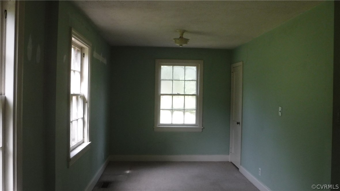 7930 Strath Road Henrico, VA 23231 - Photo 8 of 12 a view of an empty room and window