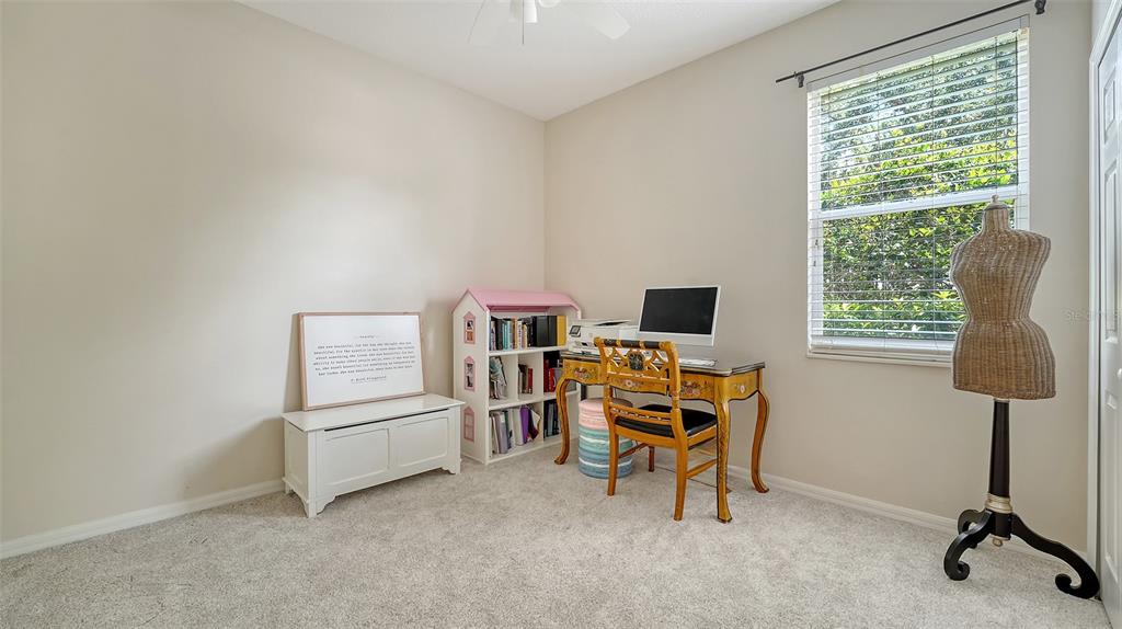 7717 US Open Loop Lakewood Ranch, FL 34202 - Photo 28 of 95 a view of a workspace with furniture and a window