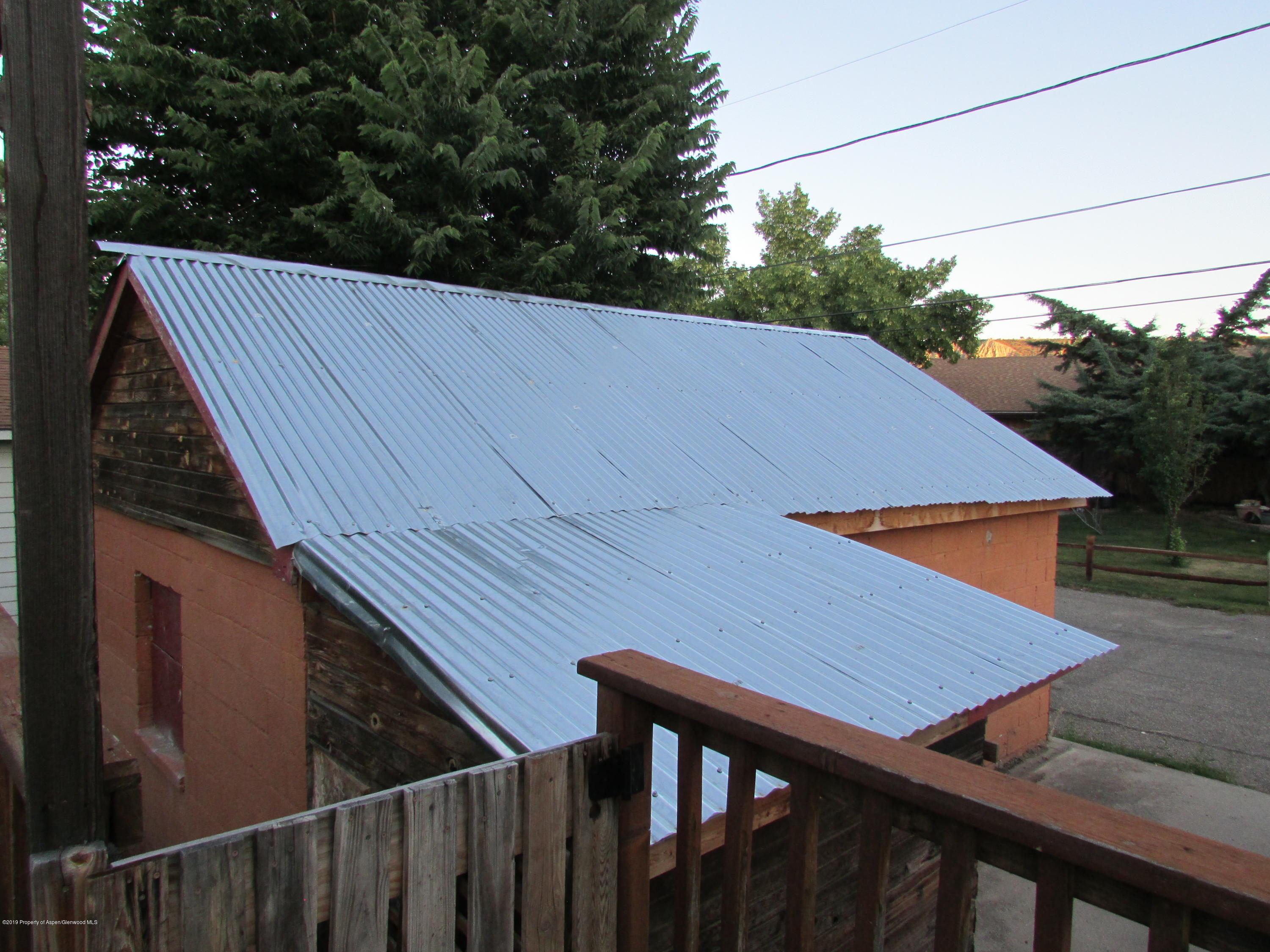 819 West 3rd Street Rifle, CO 81650 - Photo 17 of 17 a balcony with wooden floor and outdoor space