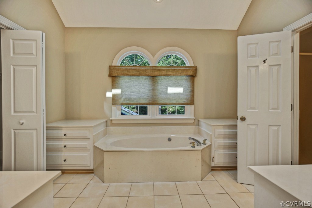 14163 Grangewood Road Midlothian, VA 23113 - Photo 18 of 24 a bathroom with a bathtub and a shower