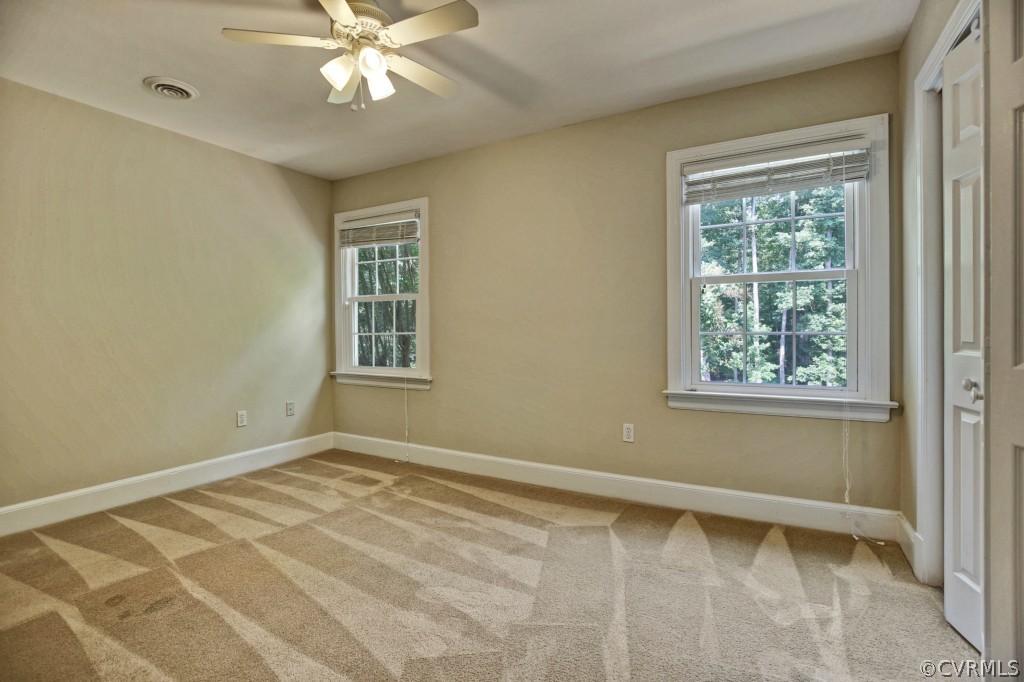 14163 Grangewood Road Midlothian, VA 23113 - Photo 20 of 24 a view of an empty room with a window