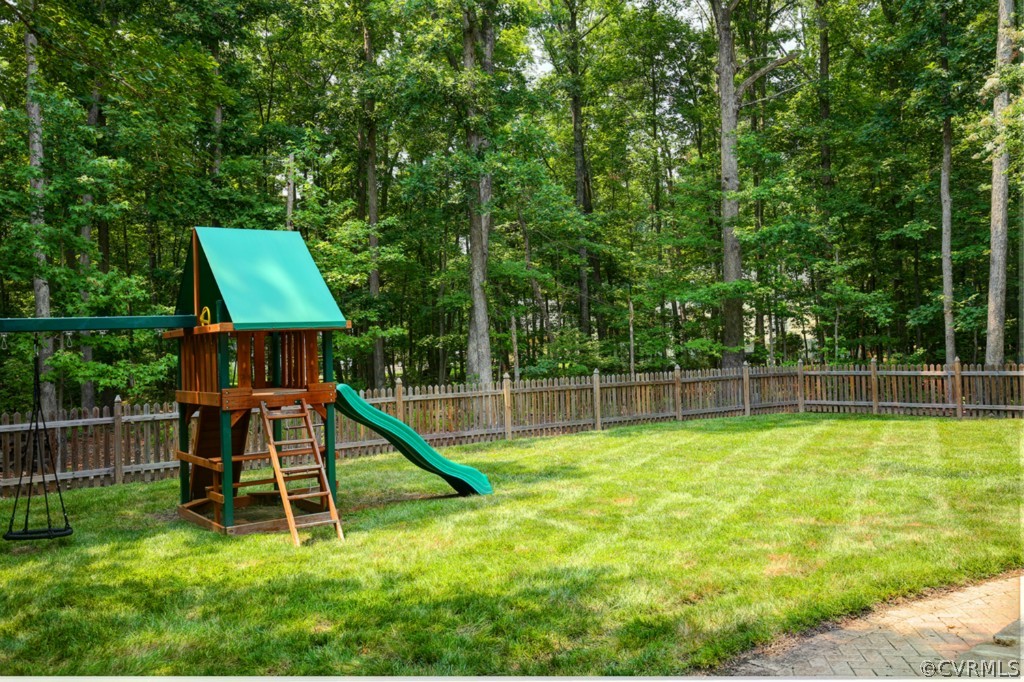 14163 Grangewood Road Midlothian, VA 23113 - Photo 22 of 24 a view of a house with a backyard