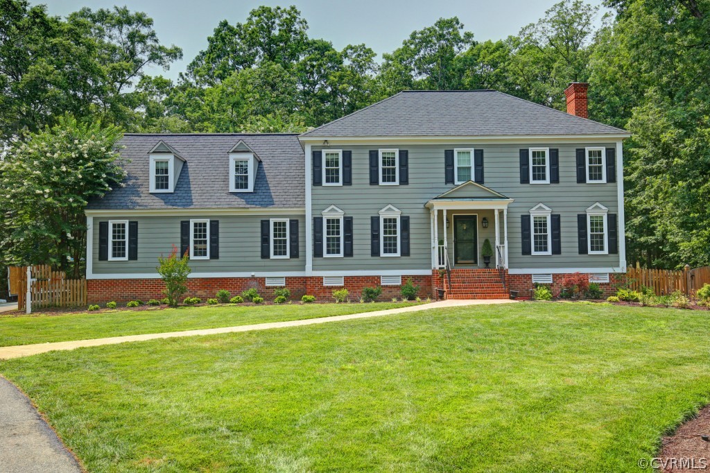 14163 Grangewood Road Midlothian, VA 23113 - Photo 3 of 24 a front view of a house with a yard
