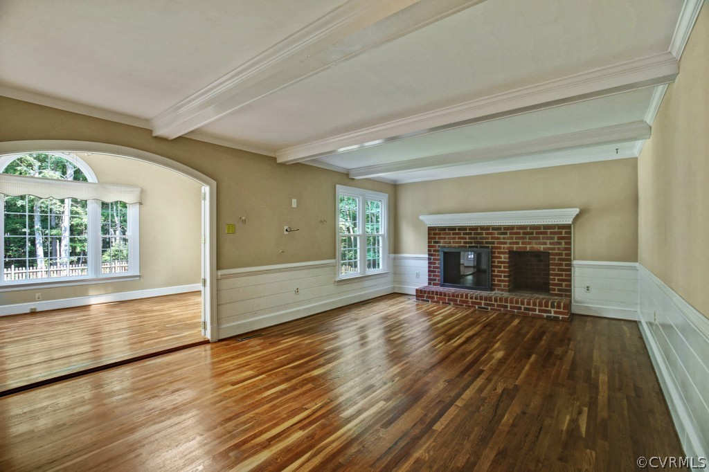 14163 Grangewood Road Midlothian, VA 23113 - Photo 9 of 24 a view of empty room with wooden floor and fireplace