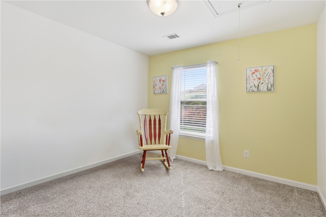 347 Riverdale Road Simpsonville, SC 29680 - Photo 16 of 30 This cozy bedroom offers comfort and a bright, inviting atmosphere perfect for relaxation.