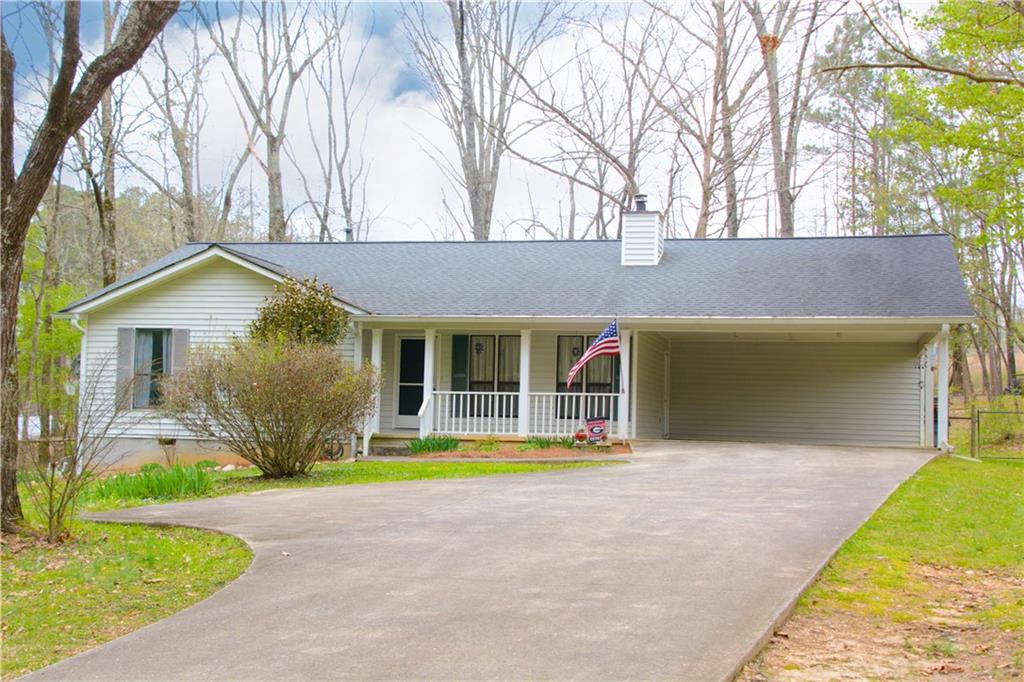 2925 South Baggett Road Winston, GA 30187 - Photo 1 of 1 a front view of a house with garden