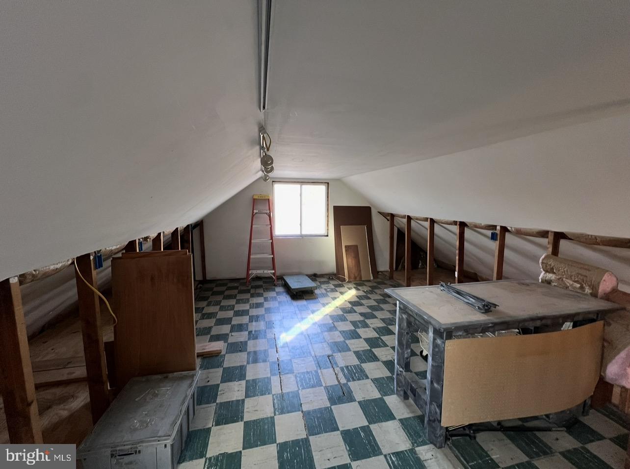 13 Beach Road Glen Burnie, MD 21060 - Photo 12 of 20 a living room with furniture a rug and a window