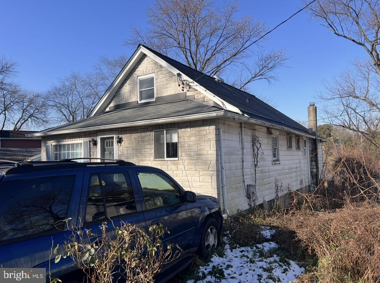 13 Beach Road Glen Burnie, MD 21060 - Photo 18 of 20 a front view of a house with garden