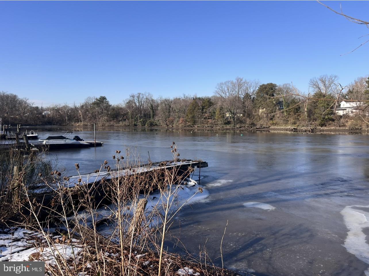 13 Beach Road Glen Burnie, MD 21060 - Photo 4 of 20 a view of a lake with houses