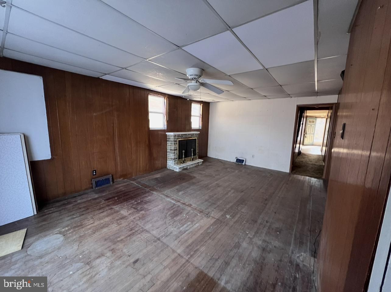 13 Beach Road Glen Burnie, MD 21060 - Photo 6 of 20 a view of empty room with wooden floor
