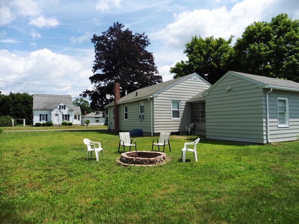 2020 Pine Street Three Rivers, MA 01080 - Photo 2 of 24 a view of backyard with house and garden