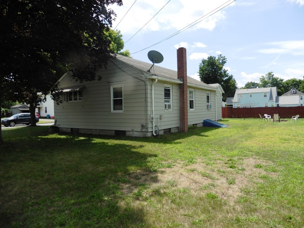 2020 Pine Street Three Rivers, MA 01080 - Photo 23 of 24 a front view of house with yard