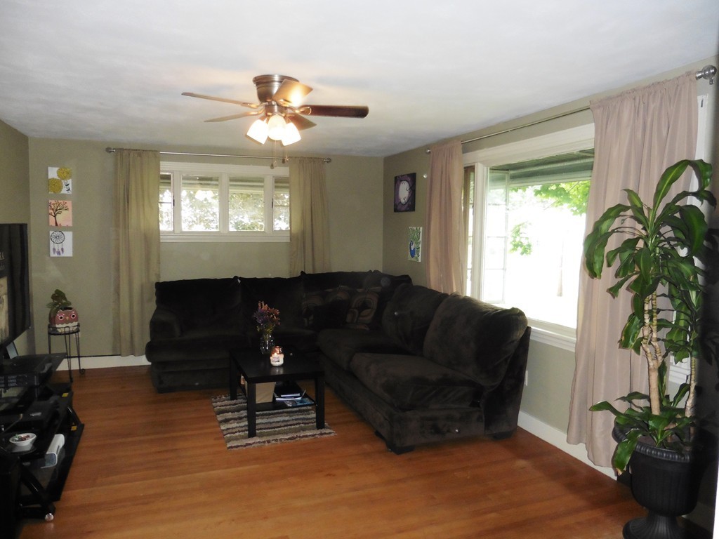 2020 Pine Street Three Rivers, MA 01080 - Photo 3 of 24 a living room with furniture and a large window