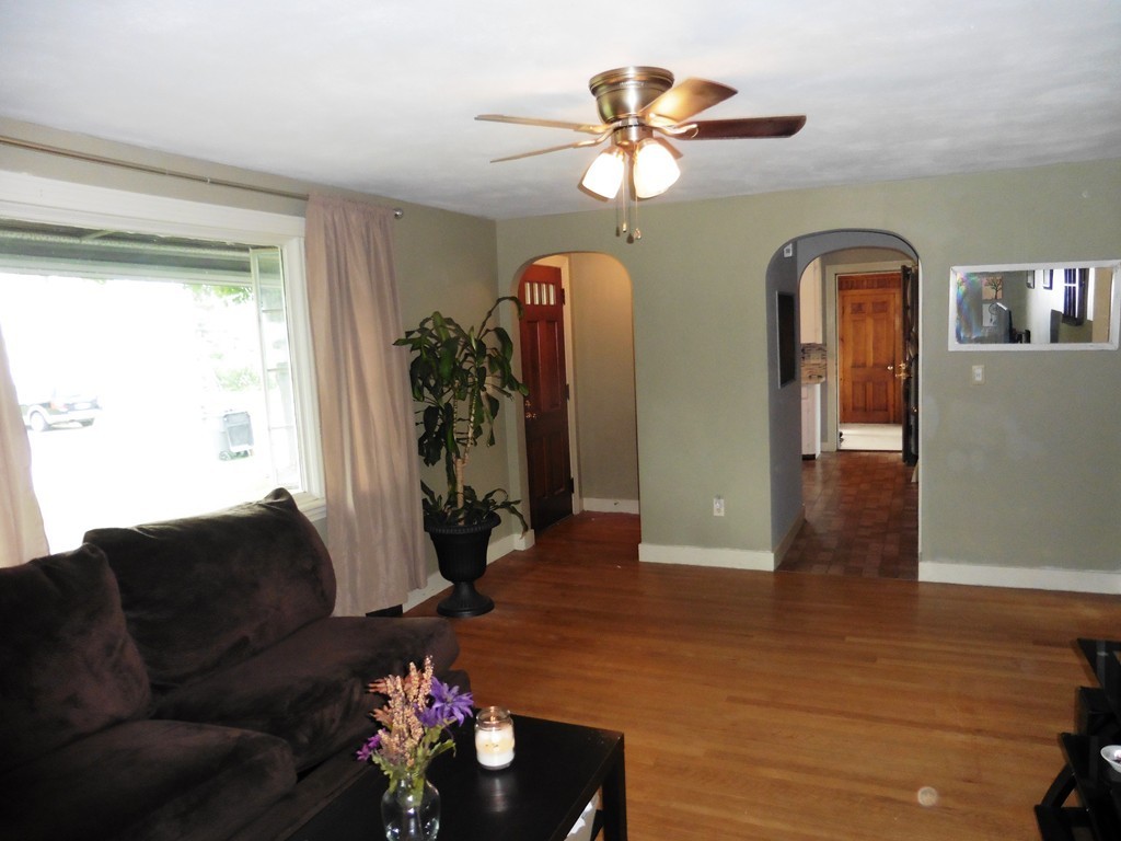 2020 Pine Street Three Rivers, MA 01080 - Photo 4 of 24 a living room with furniture and a chandelier