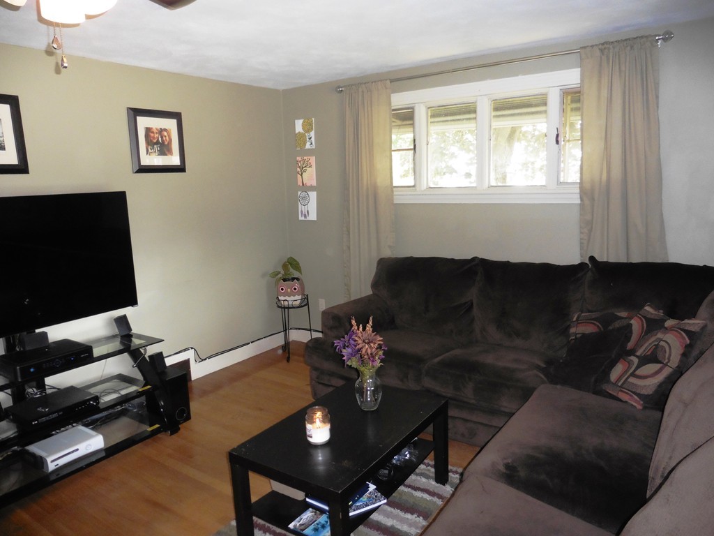 2020 Pine Street Three Rivers, MA 01080 - Photo 6 of 24 a living room with furniture and a flat screen tv
