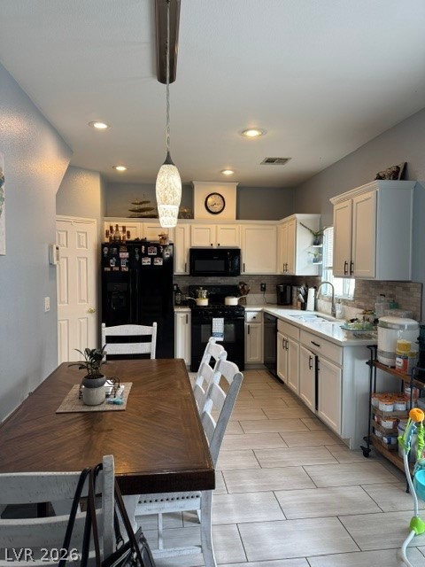 5171 Piazza Cavour Drive Las Vegas, NV 89156 - Photo 4 of 13 Culinary delights await in this eat-in kitchen with recessed lighting and contemporary appliances.