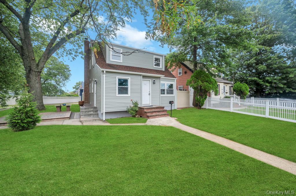 322 Baldwin Road Hempstead, NY 11550 - Photo 1 of 1 View of front of property with a chimney