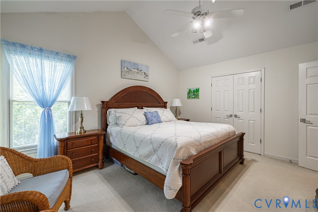 4501 Foxwood Road Chester, VA 23831 - Photo 21 of 42 Vaulted ceiling bedroom featuring plush carpeting,