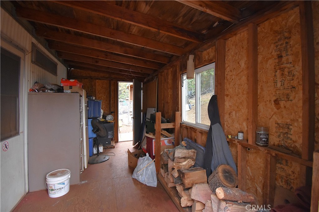 233 Renegade Road Oroville, CA 95966 - Photo 21 of 44 a view of room with wooden floor and furniture