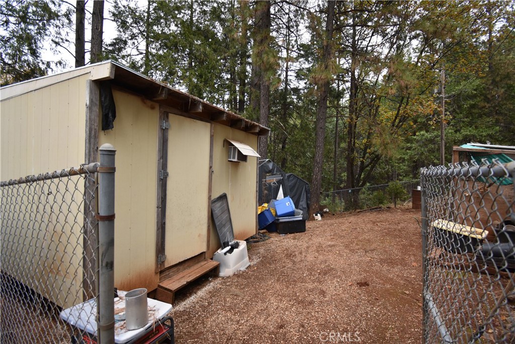 233 Renegade Road Oroville, CA 95966 - Photo 25 of 44 a view of outdoor space with seating area and trees