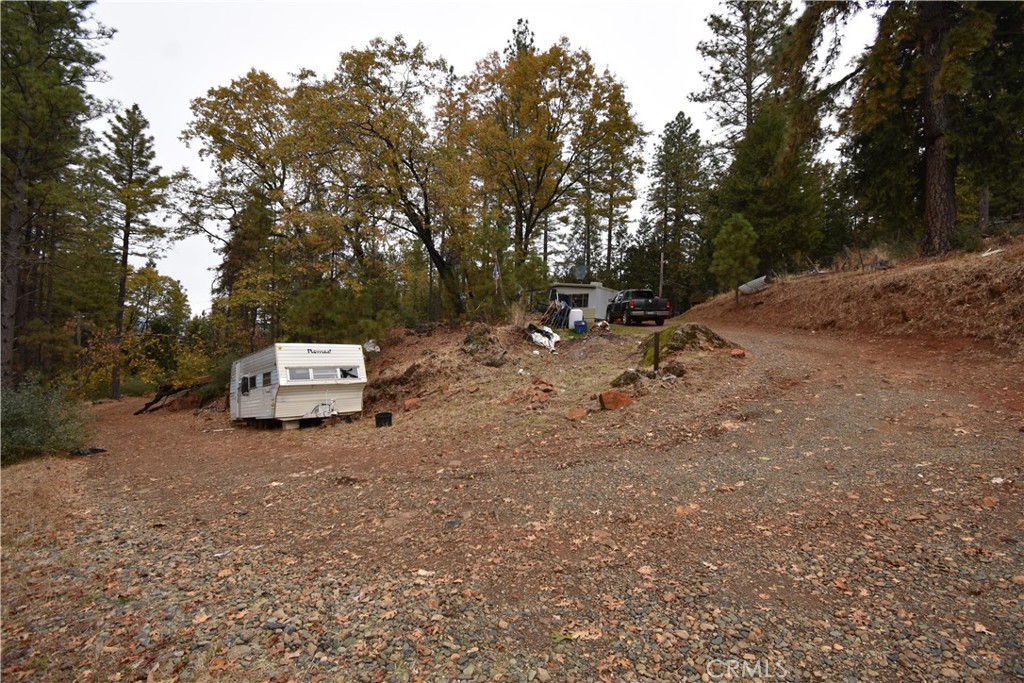 233 Renegade Road Oroville, CA 95966 - Photo 43 of 44 a view of a backyard with trees