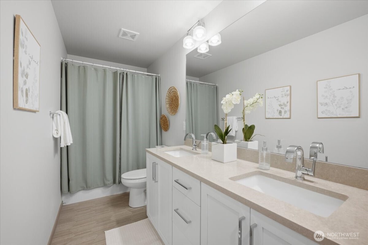20580 Sinnes Road Mount Vernon, WA 98274 - Photo 25 of 39 a bathroom with a double vanity sink toilet and a mirror