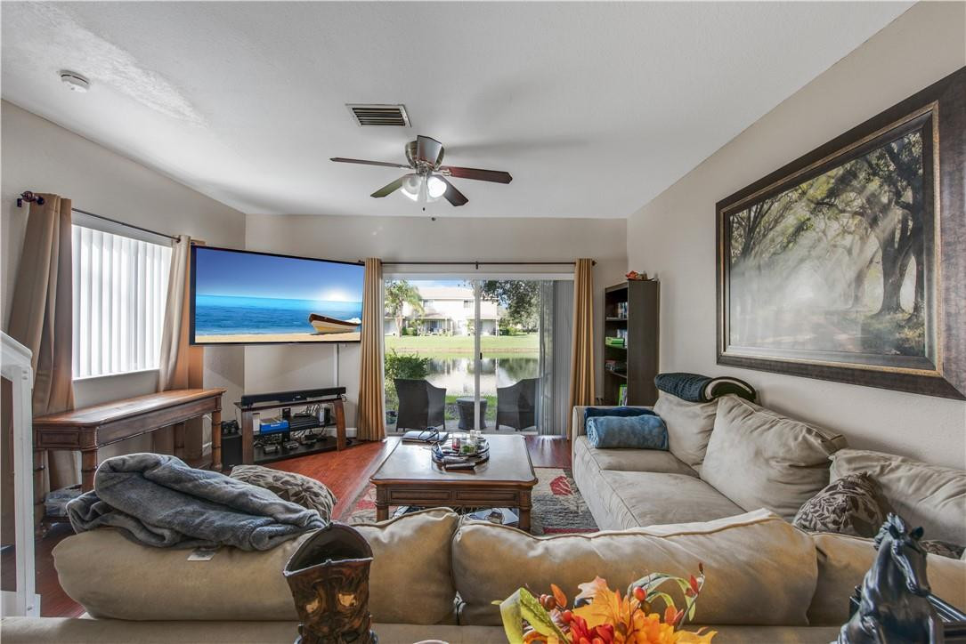 5921 Riverside Avenue Tamarac, FL 33321 - Photo 13 of 22 a living room with furniture and a large window
