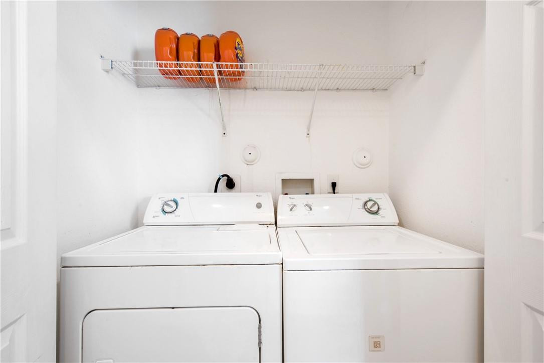 5921 Riverside Avenue Tamarac, FL 33321 - Photo 21 of 22 a utility room with dryer and washer