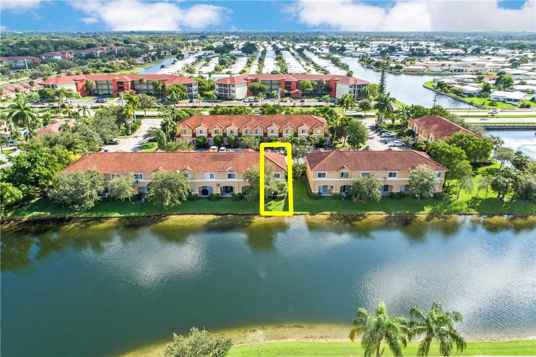 5921 Riverside Avenue Tamarac, FL 33321 - Photo 4 of 22 an aerial view of residential houses with outdoor space and swimming pool