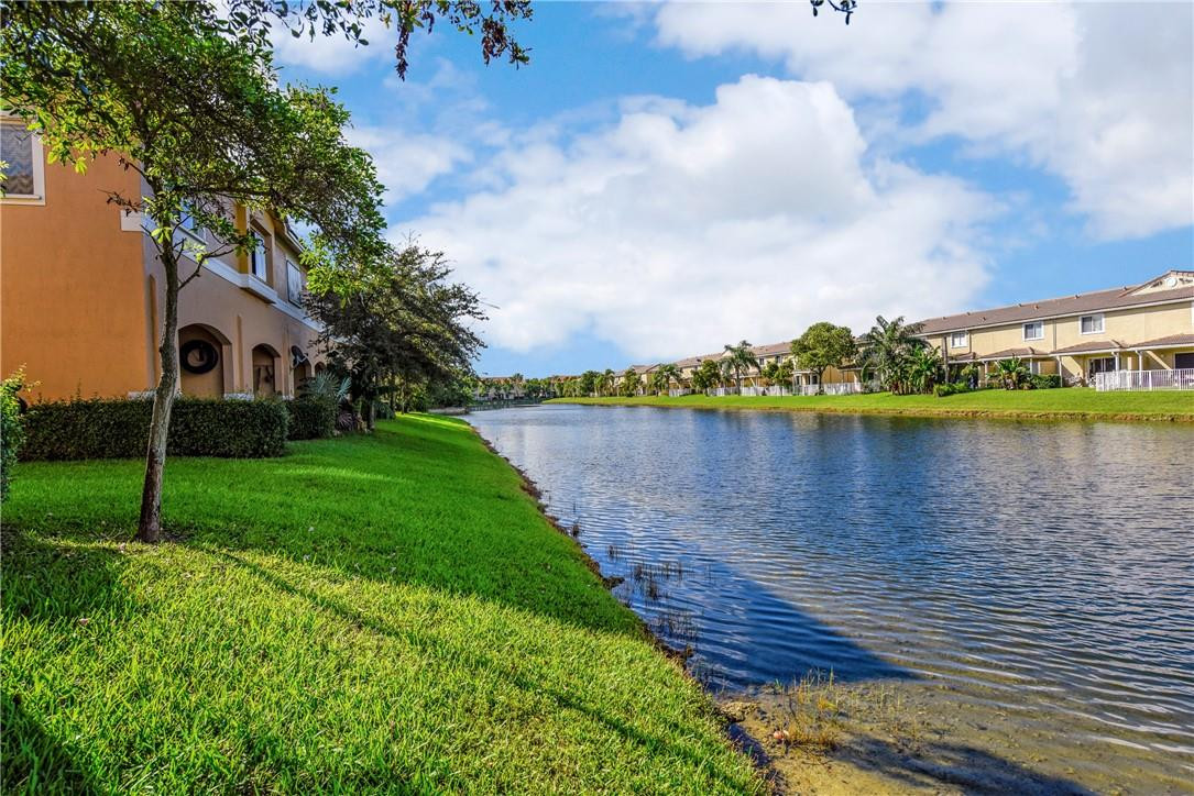 5921 Riverside Avenue Tamarac, FL 33321 - Photo 8 of 22 a view of a lake with couches and city view