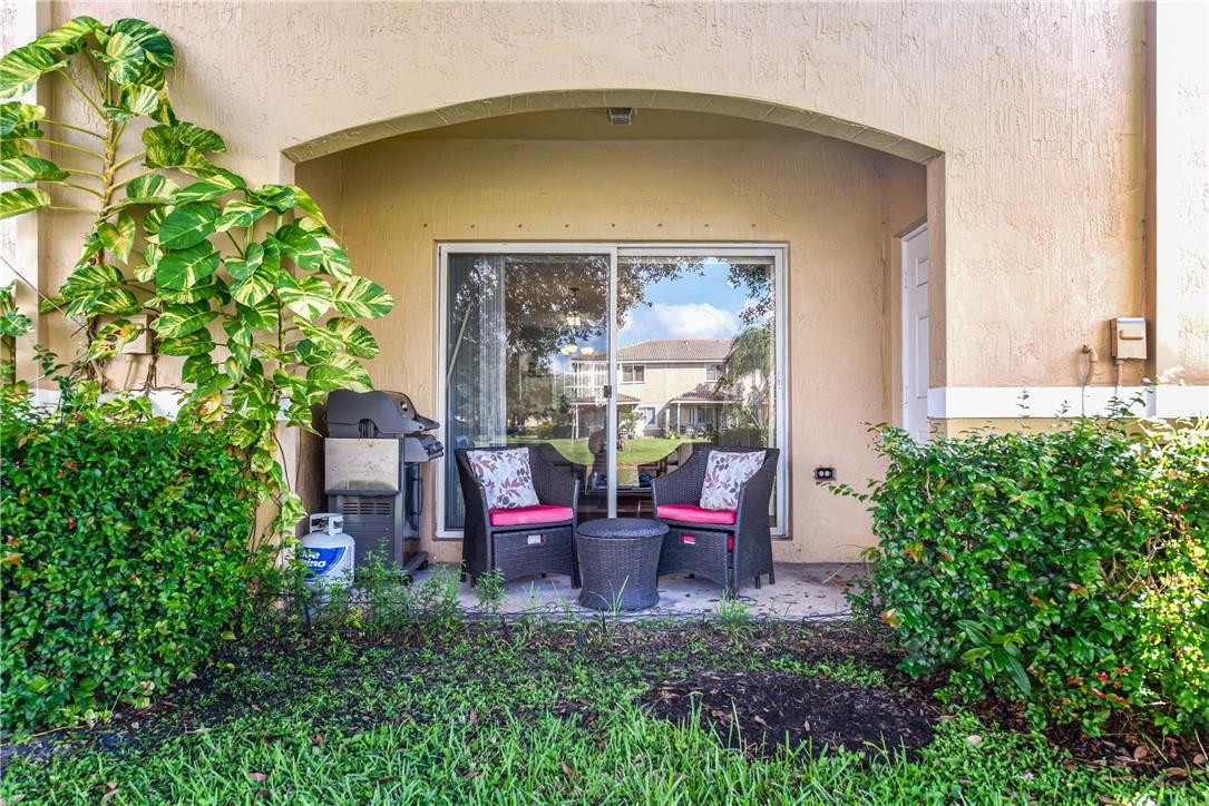 5921 Riverside Avenue Tamarac, FL 33321 - Photo 9 of 22 a view of a chairs in front of house