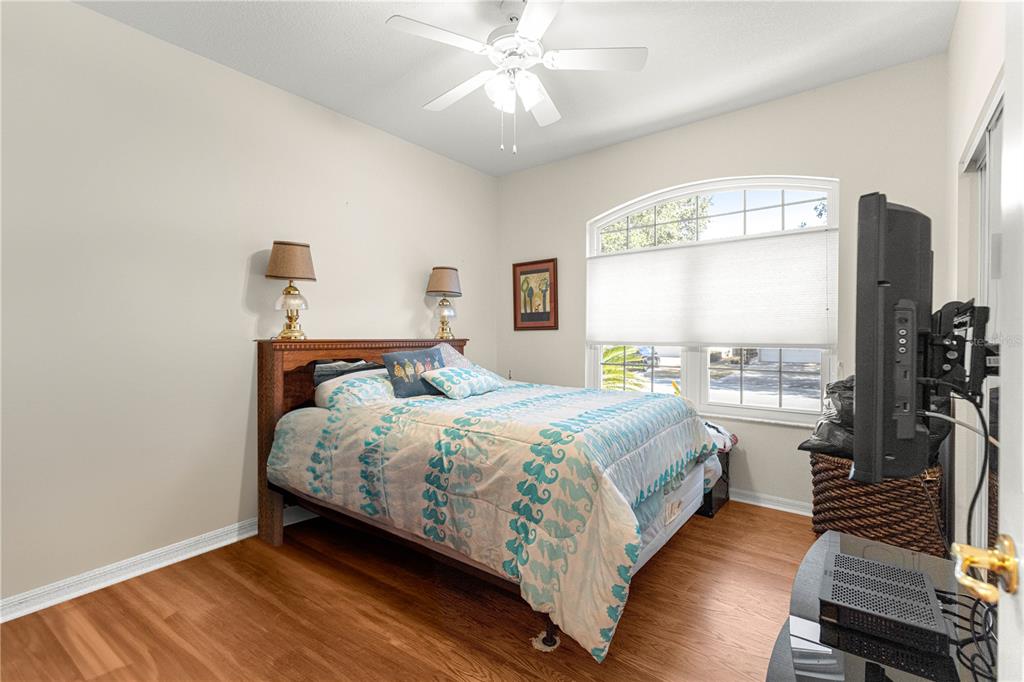 9250 Southwest 96th Court Road Ocala, FL 34481 - Photo 30 of 46 a bedroom with a bed and a window